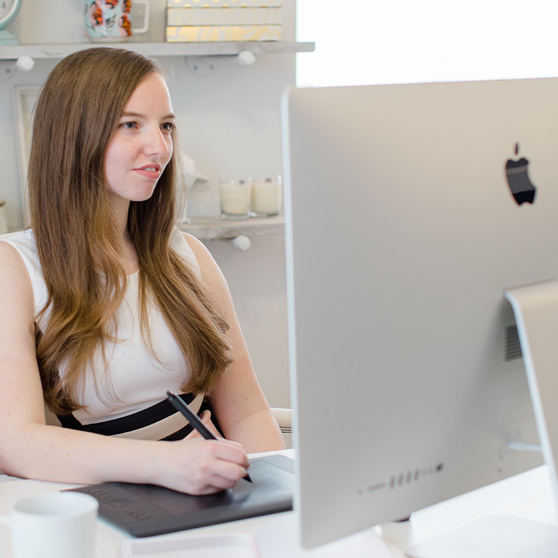 Our Process Square Image - Hannah working with drawing tablet at desk