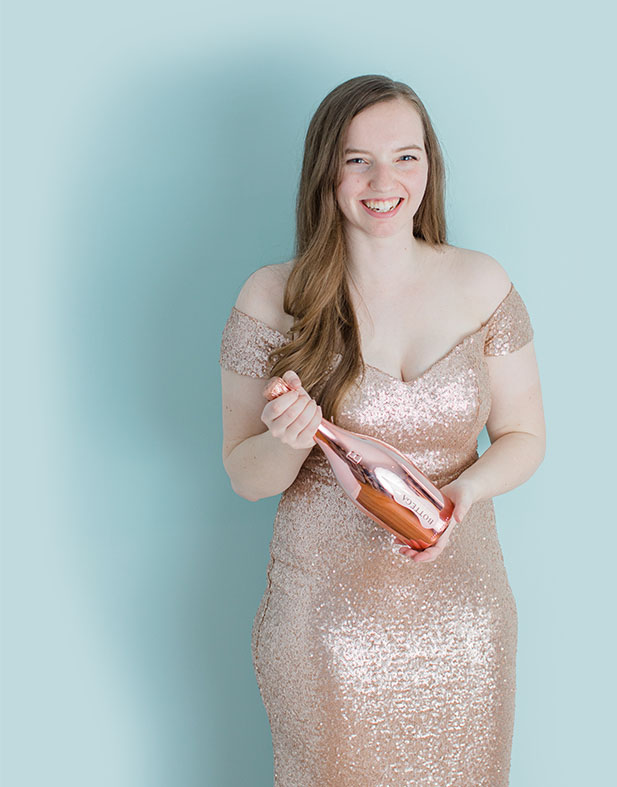 Something Blue Studio - Marketing Professionals and Designers for Wedding Pros - Photo of Hannah in Party Dress Holding Champagne - Photo by Grey Loft Studio - Full Cropped 3